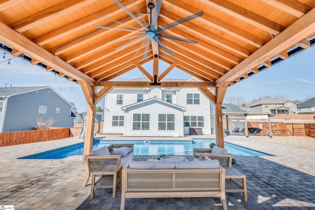 view of swimming pool featuring a gazebo, a patio area, a fenced backyard, and a fenced in pool