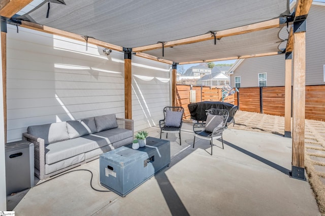 view of patio / terrace featuring outdoor lounge area and a fenced backyard