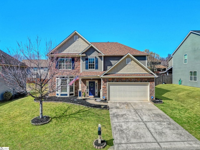 view of front of house featuring driveway, stone siding, fence, and a front yard