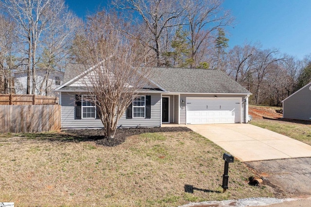 ranch-style house with a garage, driveway, a front lawn, and fence