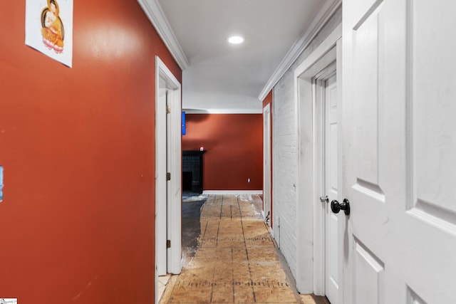 hall featuring ornamental molding and recessed lighting