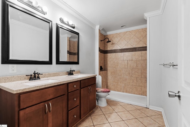 bathroom with crown molding, tile patterned flooring, a sink, and a tile shower