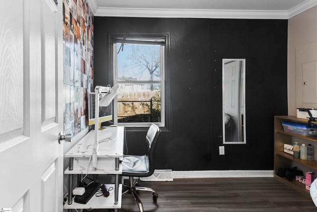 home office with ornamental molding, visible vents, baseboards, and wood finished floors