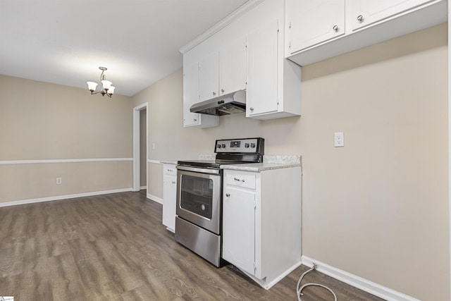 kitchen with a notable chandelier, under cabinet range hood, white cabinets, light countertops, and stainless steel range with electric stovetop