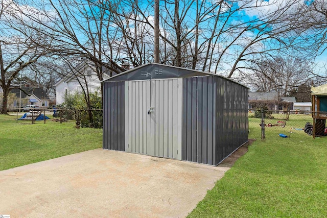 view of shed featuring a fenced backyard