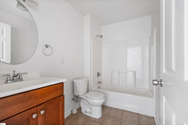 bathroom with shower / bathtub combination, toilet, vanity, baseboards, and tile patterned floors