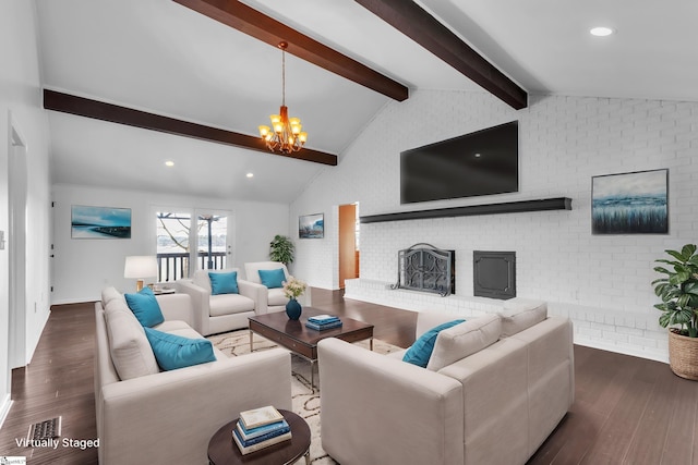 living area featuring vaulted ceiling with beams, a chandelier, recessed lighting, dark wood-style flooring, and a fireplace