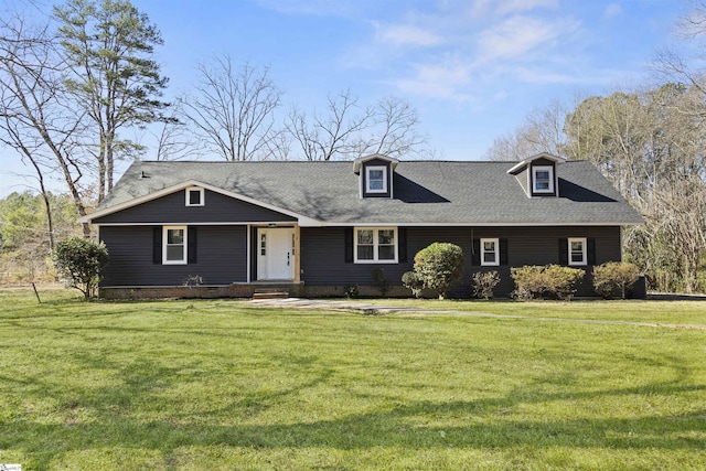 view of front of house featuring crawl space, roof with shingles, and a front lawn