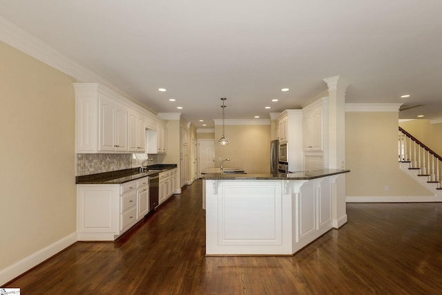 kitchen featuring baseboards, dishwasher, dark wood-type flooring, white cabinetry, and backsplash