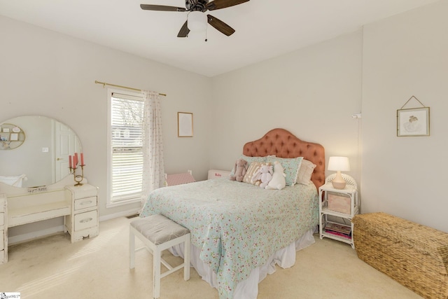 bedroom with ceiling fan and carpet flooring