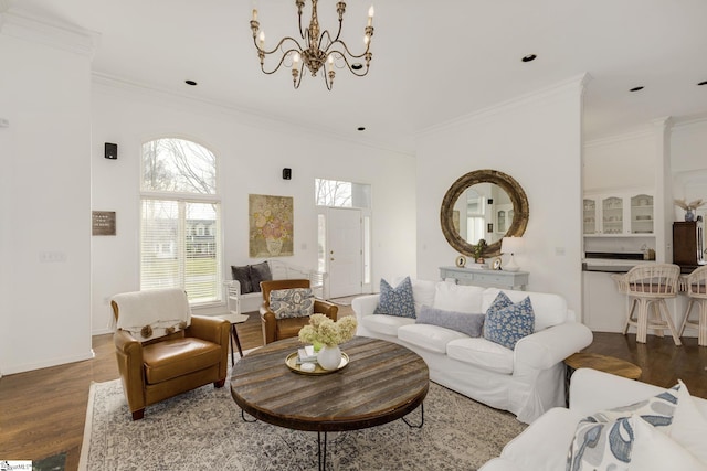 living area with ornamental molding, recessed lighting, dark wood finished floors, and baseboards