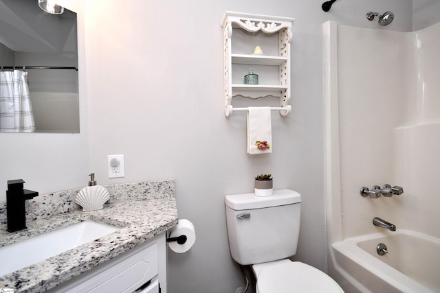 bathroom with vanity, shower / bath combination with curtain, and toilet