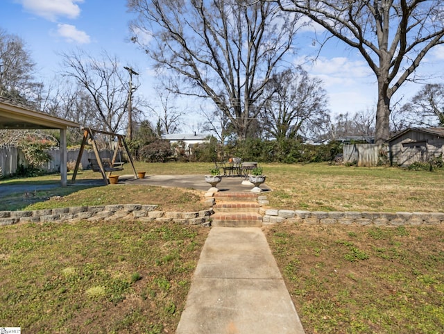 view of yard featuring fence