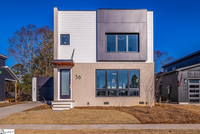 contemporary house with crawl space and driveway