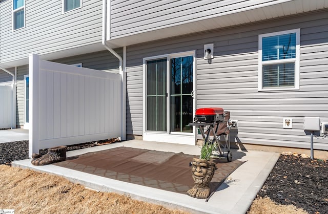 view of patio featuring a grill