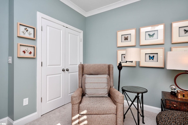 living area featuring carpet floors and baseboards