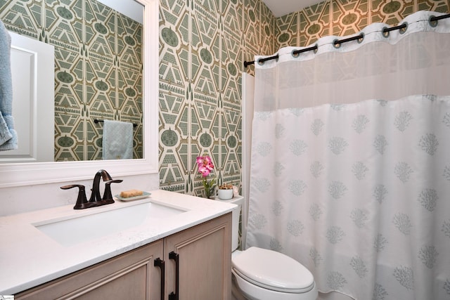 full bath with toilet, wallpapered walls, a shower with shower curtain, and vanity