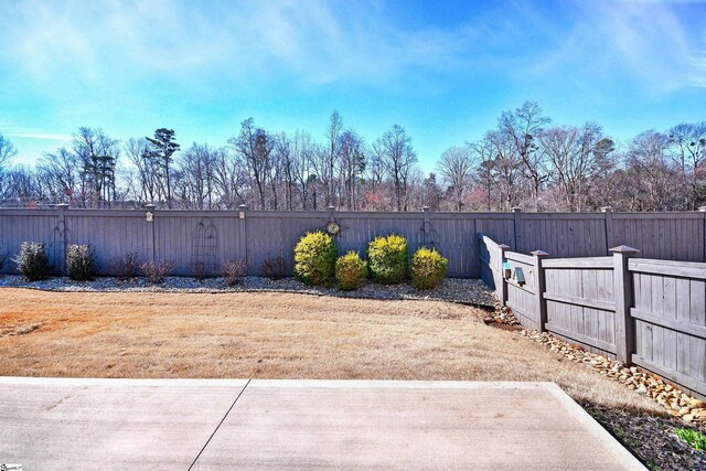 view of yard featuring fence private yard