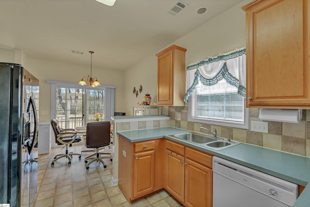 kitchen with white dishwasher, visible vents, a sink, and black fridge with ice dispenser