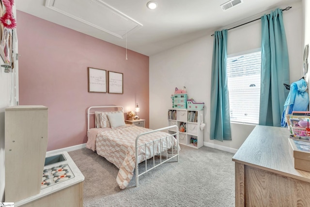 carpeted bedroom with attic access, visible vents, and baseboards