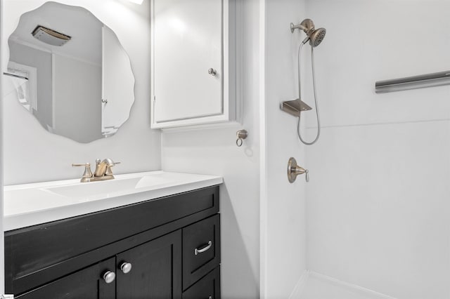 full bathroom with a shower and vanity