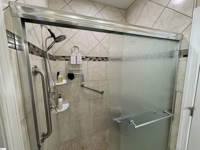 bathroom featuring a shower stall