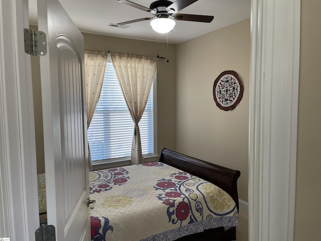 bedroom with visible vents and ceiling fan