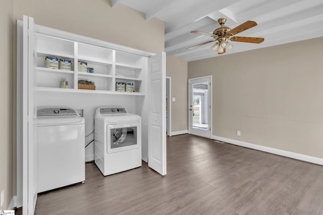 laundry room featuring ceiling fan, washing machine and dryer, laundry area, baseboards, and dark wood finished floors