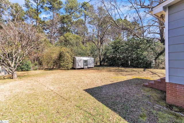 view of yard with a storage unit and an outdoor structure