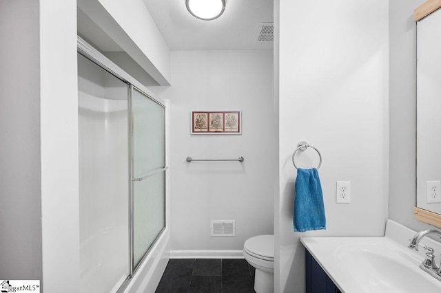 full bathroom featuring toilet, visible vents, and a shower with shower door