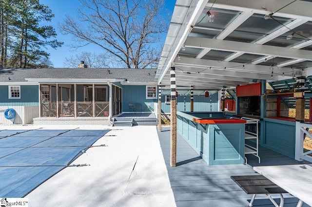 exterior space with a patio area and a wooden deck