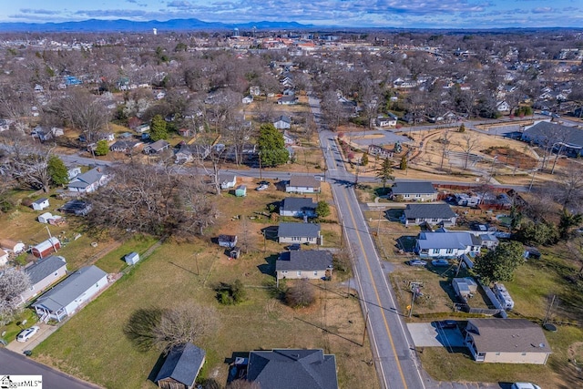 aerial view featuring a residential view and a mountain view