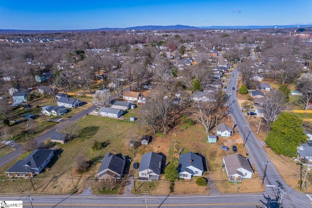 aerial view featuring a mountain view and a residential view