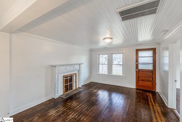 unfurnished living room featuring a fireplace with flush hearth, visible vents, baseboards, wood-type flooring, and crown molding