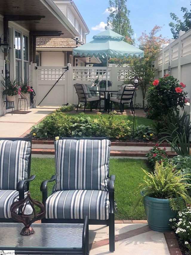 exterior space featuring a gate and fence