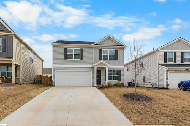 view of front of property with an attached garage, cooling unit, fence, concrete driveway, and board and batten siding