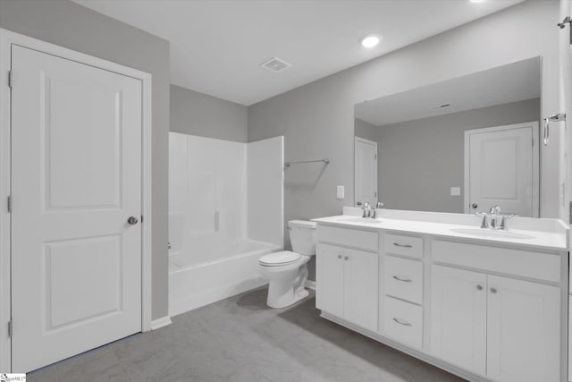 full bathroom with visible vents, a sink, toilet, and double vanity