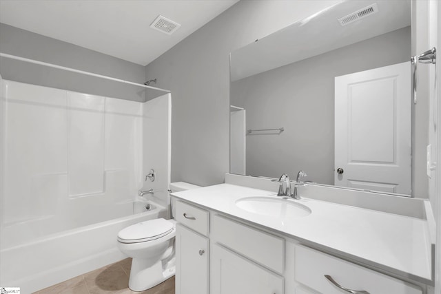 bathroom featuring toilet, tile patterned floors, visible vents, and vanity