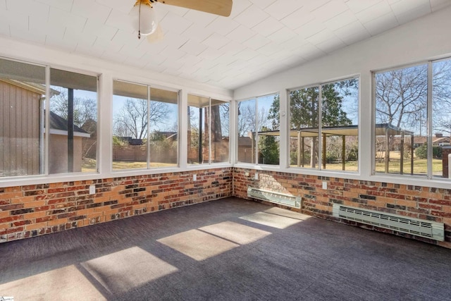 unfurnished sunroom with a baseboard radiator and ceiling fan