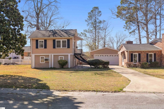 view of front of home with a chimney, stairway, fence, and an outbuilding