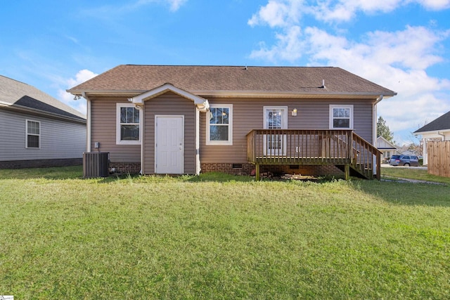 back of property featuring a yard, a shingled roof, crawl space, central AC, and a wooden deck