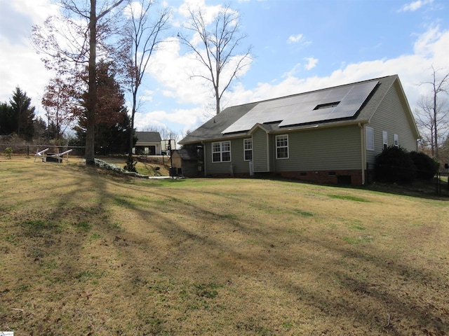 exterior space with a yard and crawl space