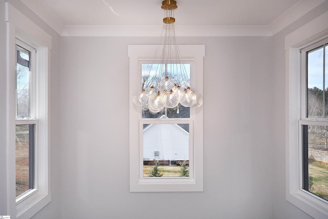 unfurnished dining area featuring a wealth of natural light