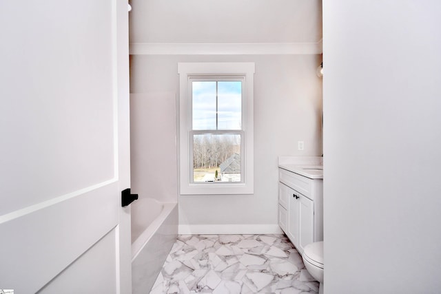 full bathroom with baseboards, toilet, marble finish floor, vanity, and a bath