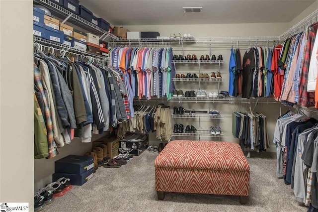 walk in closet with carpet flooring and visible vents