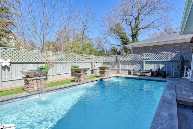 view of pool featuring a fenced backyard and a fenced in pool