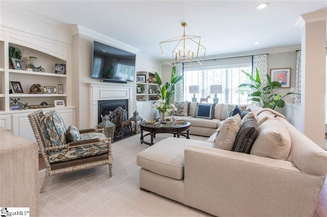 living area with built in shelves, a fireplace, light colored carpet, and crown molding