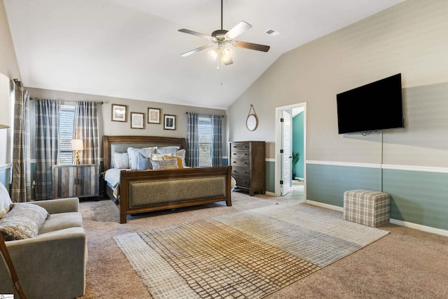 bedroom featuring baseboards, visible vents, a ceiling fan, carpet, and vaulted ceiling