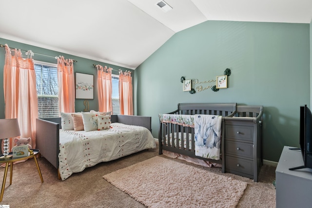 carpeted bedroom with vaulted ceiling and visible vents