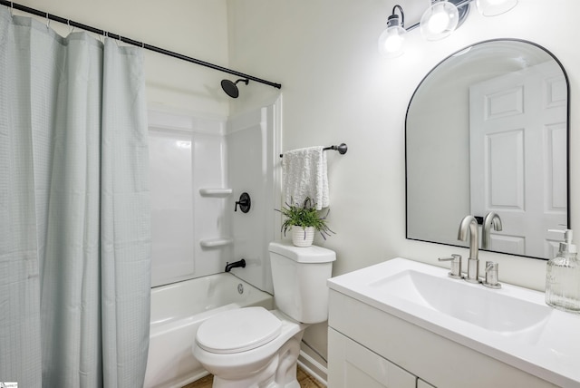 bathroom featuring shower / tub combo with curtain, vanity, and toilet